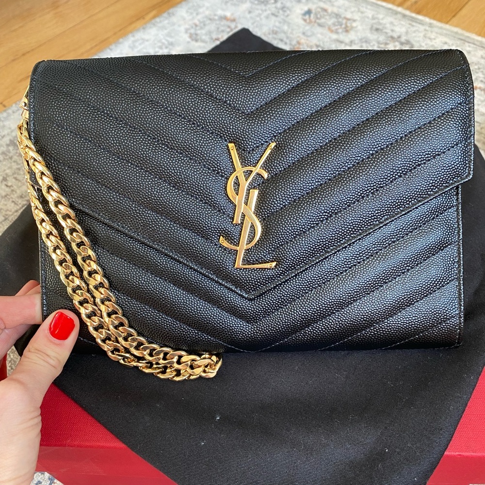 SOLD YSL monogram clutch wristlet